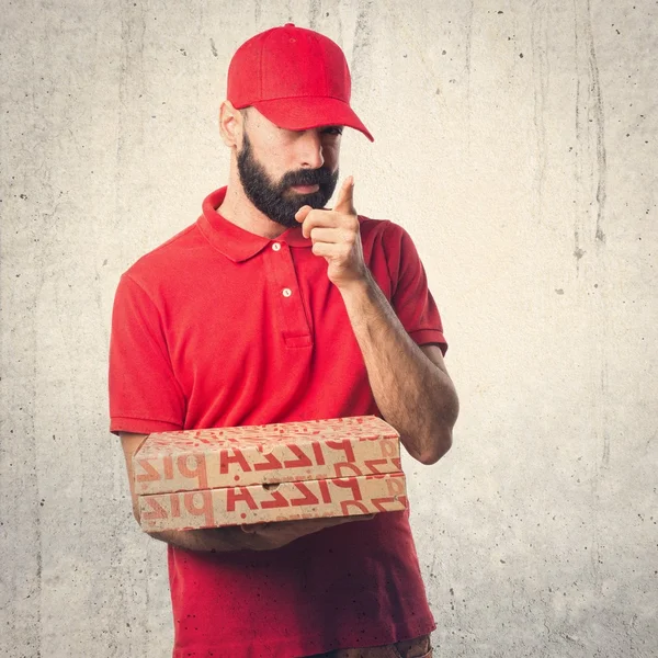 Pizza levering man naar de voorzijde — Stockfoto