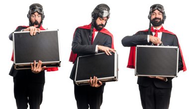 Süper kahraman işadamı bir evrak çantası elinde