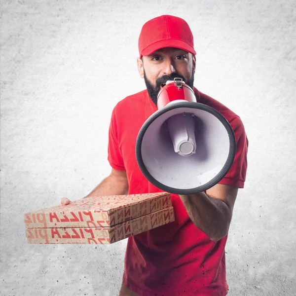 Pizza levering man schreeuwen door megafoon — Stockfoto