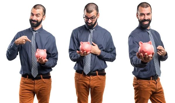 Man holding a piggybank — Stock Photo, Image