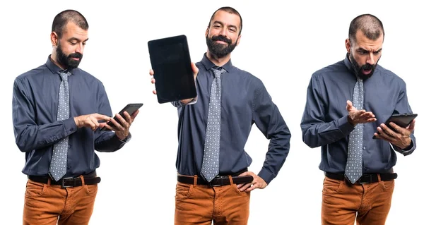 Hombre sosteniendo una tableta —  Fotos de Stock