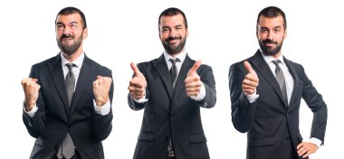 Baş parmağı havada bir iş adamı.