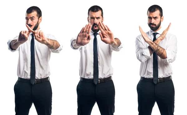 Geschäftsmann macht Stoppschild — Stockfoto