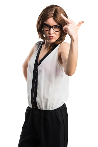 Brunette woman making horn gesture — Stock Photo, Image