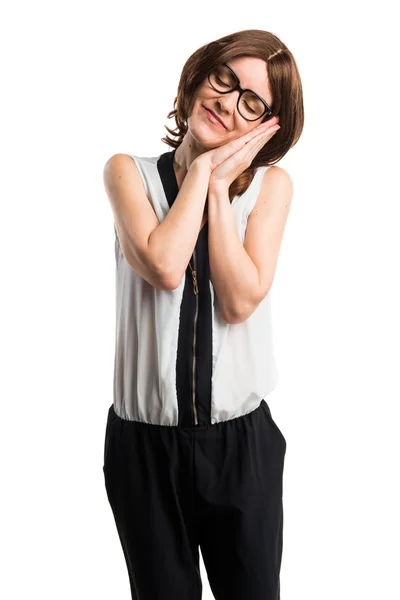 Brunette woman doing sleep gesture — Stock Photo, Image