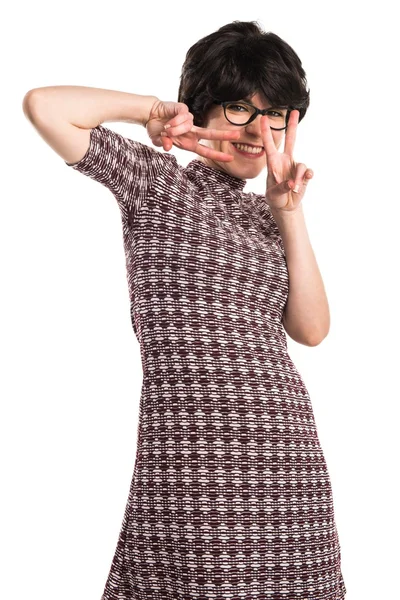 Girl doing victory gesture — Stock Photo, Image