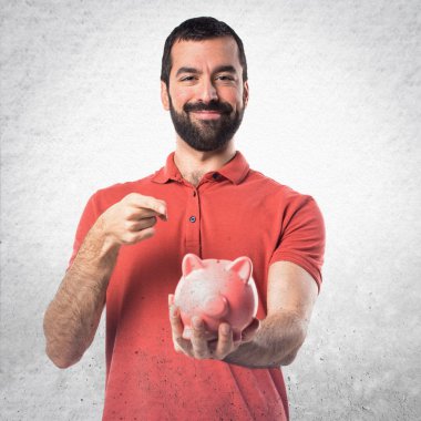 Yakışıklı adam bir servet tutuyor