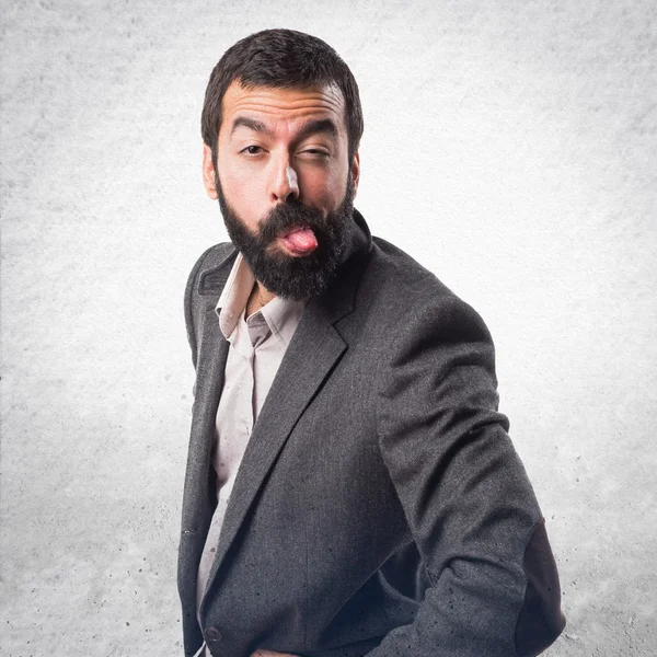 Man taking out his tongue — Stock Photo, Image