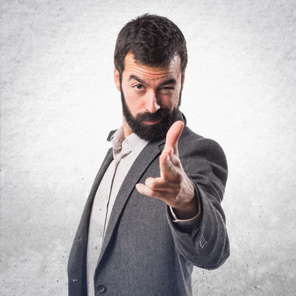 Man making gun gesture — Stock Photo, Image