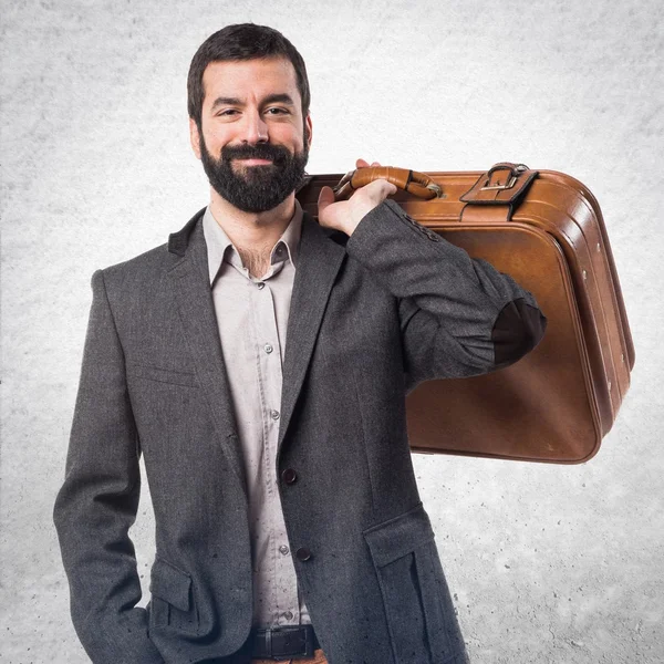 Mężczyzna trzymający walizkę — Zdjęcie stockowe