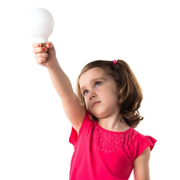 Girl holding a bulb — Stock Photo, Image