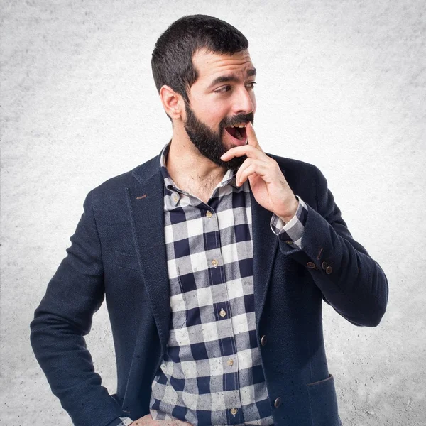 Hombre guapo haciendo gesto sorpresa — Foto de Stock