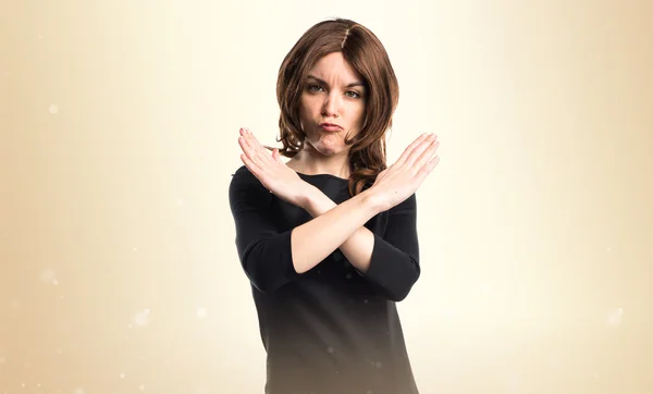 Brunette woman doing NO gesture — Stock Photo, Image