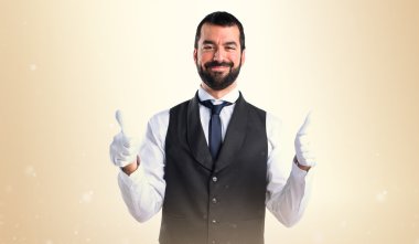 Başparmak ile lüks garson