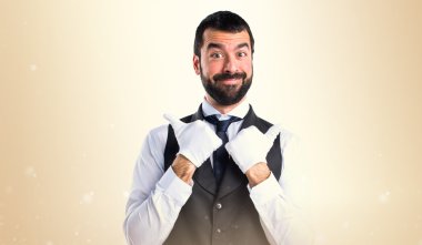 Başparmak ile lüks garson