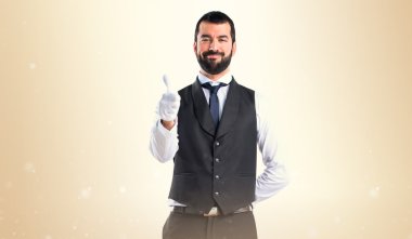 Başparmak ile lüks garson