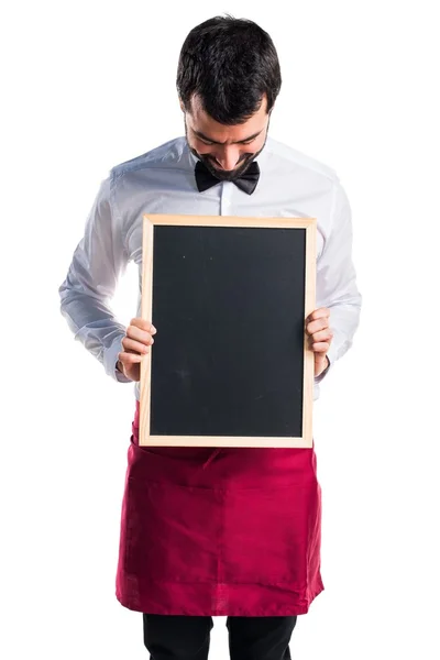 Číšníku, drží prázdné cedulky — Stock fotografie