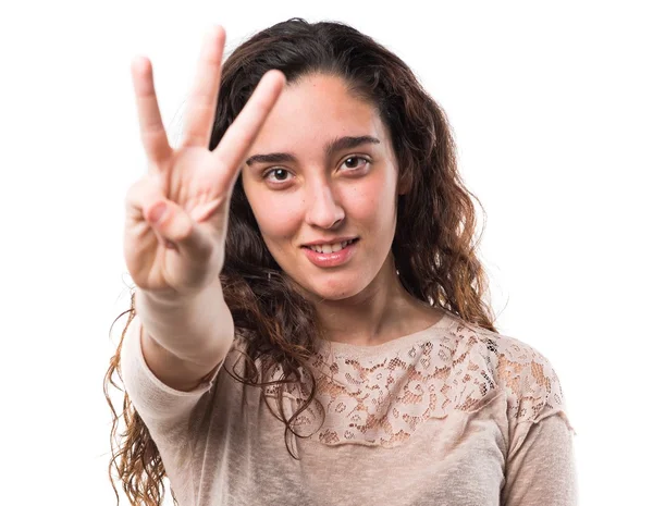 Teenager-Mädchen zählt drei — Stockfoto