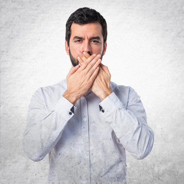 Man covering his mouth — Stock Photo, Image