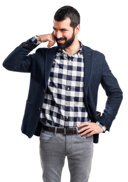 Bonito homem fazendo gesto de telefone — Fotografia de Stock