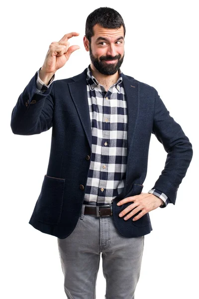 Hombre guapo haciendo pequeña señal — Foto de Stock