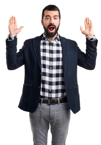 Pohledný muž dělá gesto překvapení — Stock fotografie