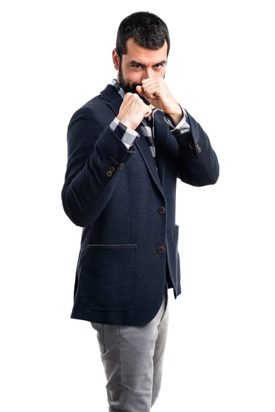 Handsome man giving a punch — Stock Photo, Image