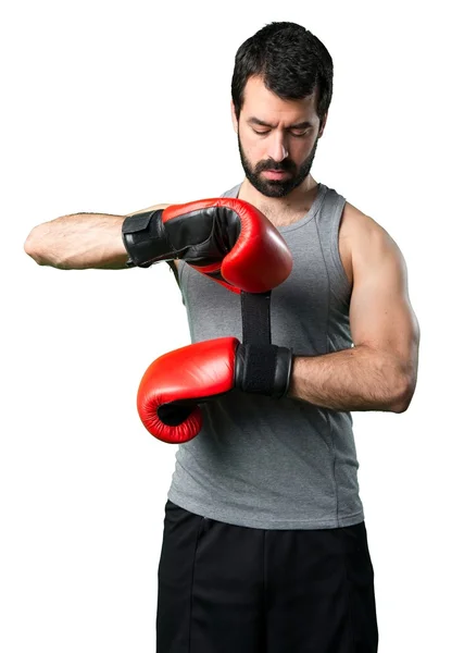 Desportista com luvas de boxe — Fotografia de Stock