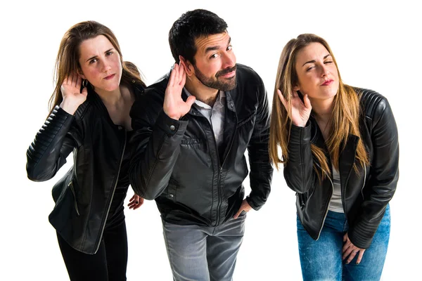 Three friends over isolated white background Stock Image