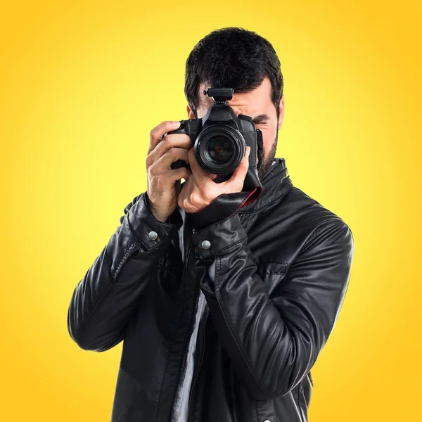 Handsome man over colorful background — Stock Photo, Image