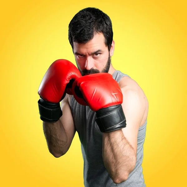 Deportista con guantes de boxeo —  Fotos de Stock