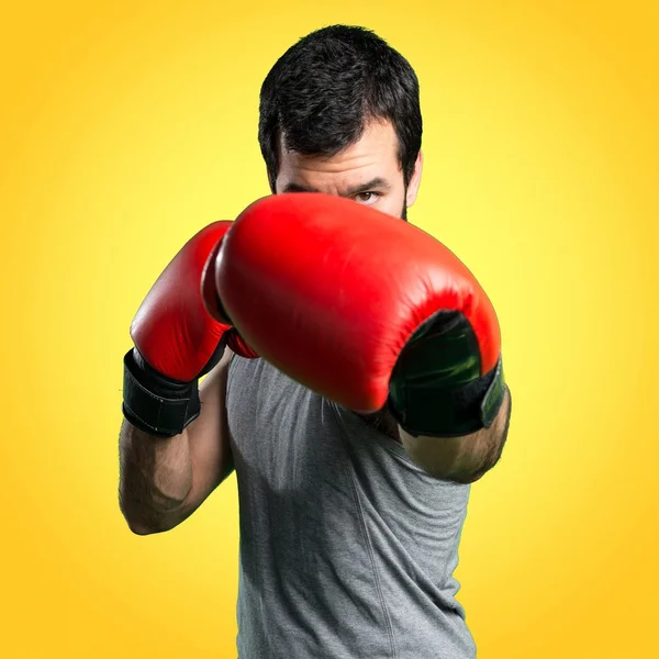 Sportman with boxing gloves — Stock Photo, Image