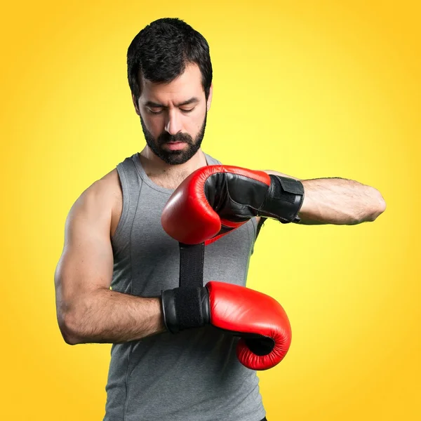 Sportman with boxing gloves — Stock Photo, Image