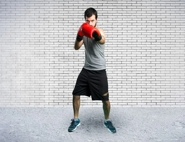 Deportista con guantes de boxeo — Foto de Stock