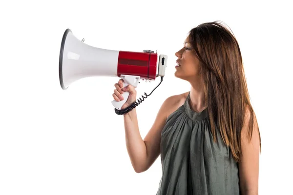 Young girl shouting by megaphone — Stock Photo, Image