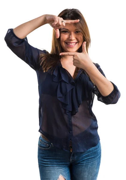 Young girl focusing with her fingers — Stock Photo, Image