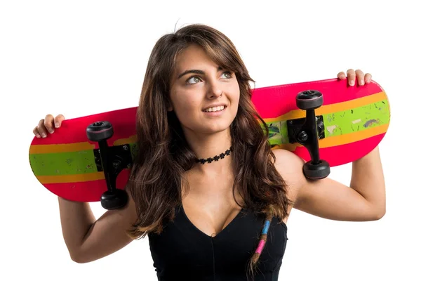 Giovane ragazza con skateboard — Foto Stock