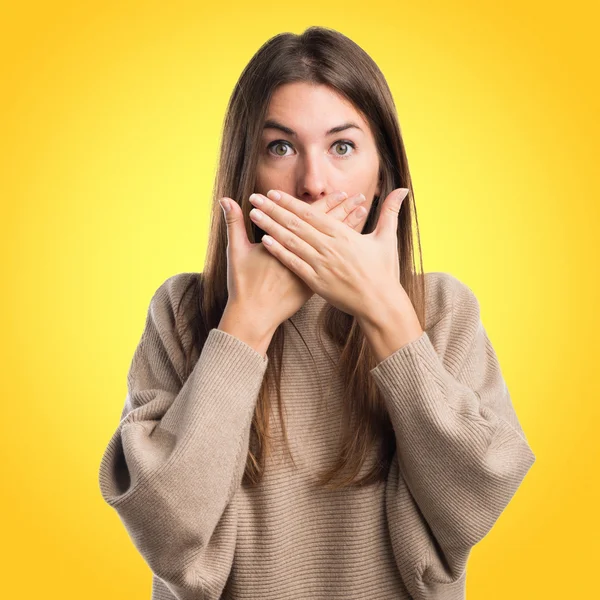 Girl covering her mouth — Stock Photo, Image