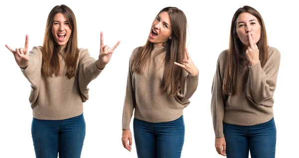 Girl making horn gesture — Stock Photo, Image