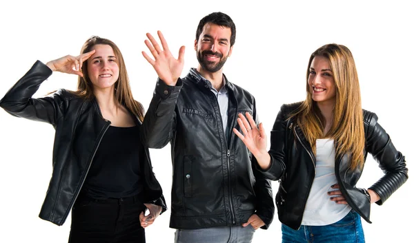 Tres amigos con saludo de cuero negro —  Fotos de Stock