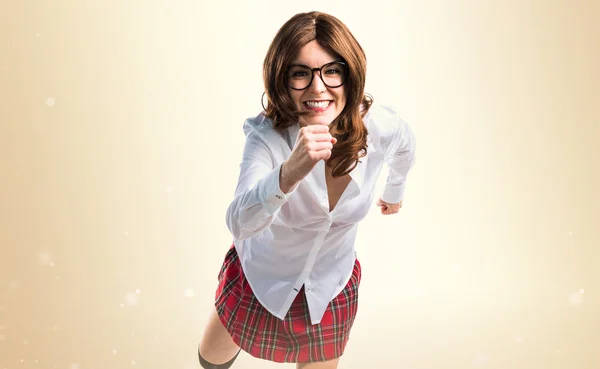 Pretty young girl running fast — Stock Photo, Image