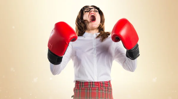 Schülerin mit Boxhandschuhen — Stockfoto