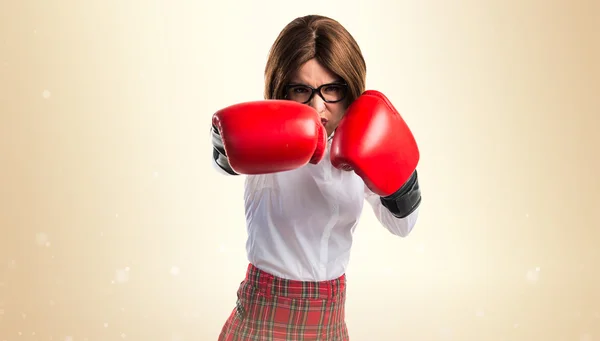 Student girl with boxing gloves — Stock Photo, Image