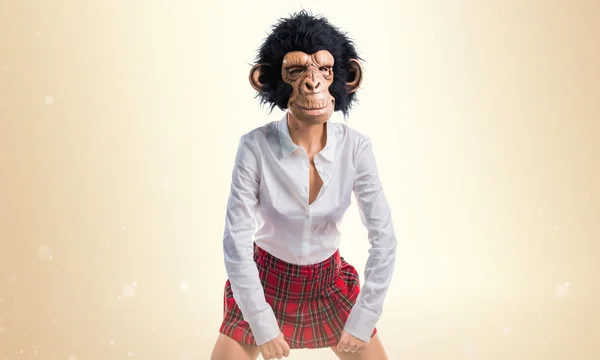 Girl with monkey mask — Stock Photo, Image