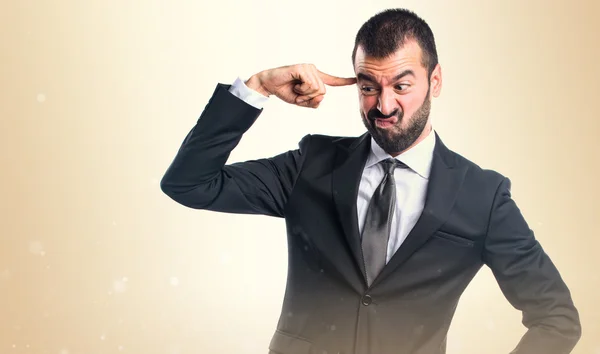 Businessman making crazy gesture — Stock Photo, Image