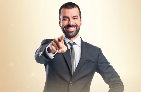 Businessman pointing to the front — Stock Photo, Image