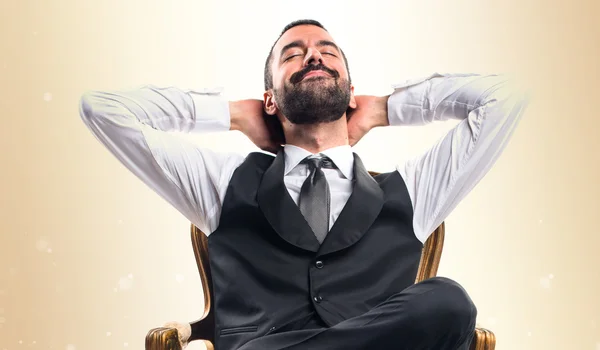 Empresario sentado en sillón — Foto de Stock