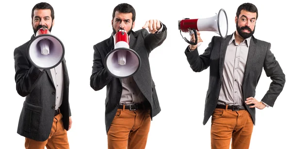 Hombre gritando por megáfono — Foto de Stock