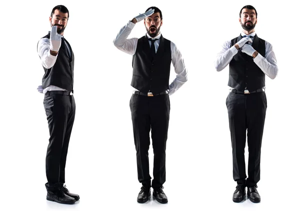 Luxury waiter doing surprise gesture — Stock Photo, Image