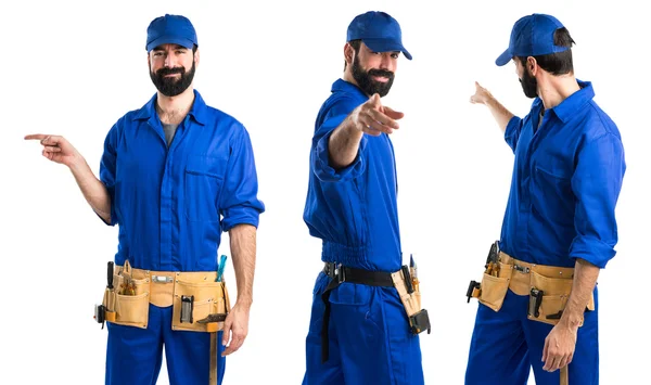 Plumber pointing to the front — Stock Photo, Image